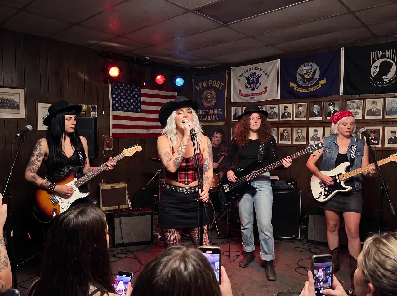 Daddy, No! playing a dim VFW hall in Bug Tussle, Alabama, under service flags and photos of local veterans.